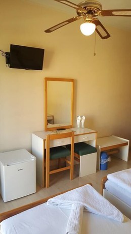 Imagen de la habitación del Hotel Moustakis. Foto 8
