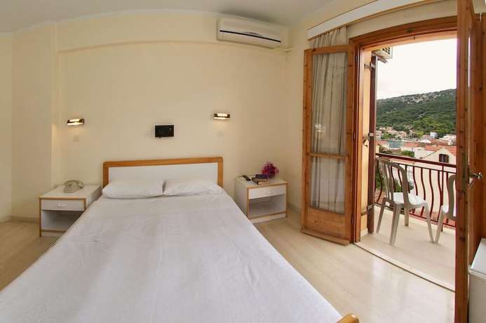 Imagen de la habitación del Hotel Moustakis. Foto 11