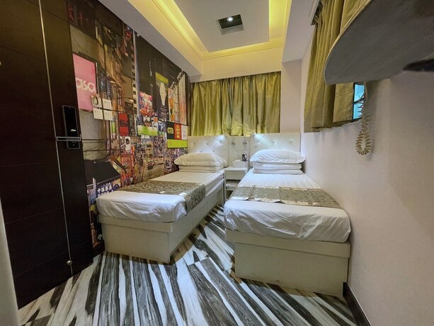 Imagen de la habitación del Hotel Move Inn. Foto 17