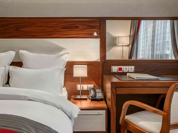 Imagen de la habitación del Hotel Movenpick Sarajevo. Foto 11