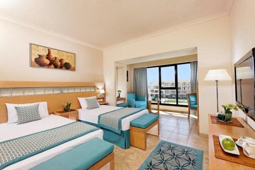 Imagen de la habitación del Hotel Mövenpick Waterpark Resort and Spa Soma Bay. Foto 12