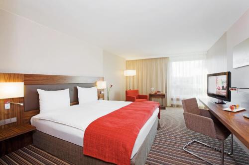 Imagen de la habitación del Hotel Movenpick Zuerich-airport. Foto 16