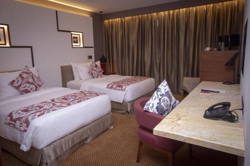Imagen de la habitación del Hotel Movenpick and Convention Centre KLIA. Foto 13