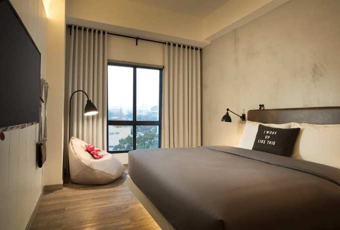Imagen de la habitación del Hotel Moxy Bandung. Foto 7