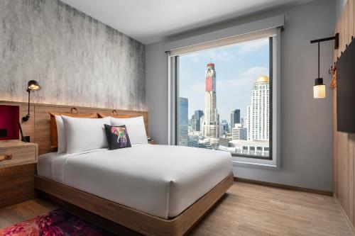 Imagen de la habitación del Hotel Moxy Bangkok Ratchaprasong. Foto 4