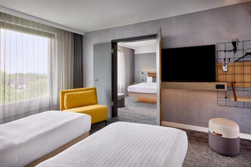 Imagen de la habitación del Hotel Moxy Bochum. Foto 7