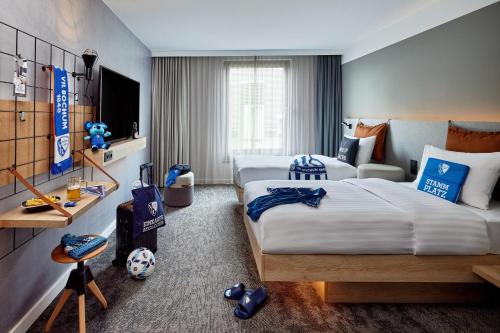 Imagen de la habitación del Hotel Moxy Bochum. Foto 10