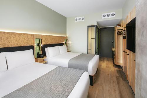 Imagen de la habitación del Hotel Moxy Brooklyn Williamsburg. Foto 3