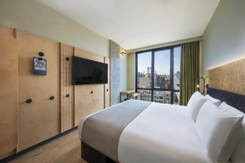 Imagen de la habitación del Hotel Moxy Brooklyn Williamsburg. Foto 9