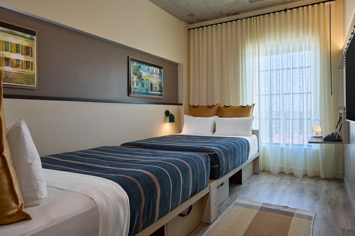 Imagen de la habitación del Hotel Moxy Charleston Downtown. Foto 12