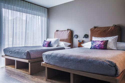 Imagen de la habitación del Hotel Moxy Chicago Downtown. Foto 20