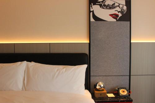 Imagen de la habitación del Hotel Moxy Chongqing. Foto 18