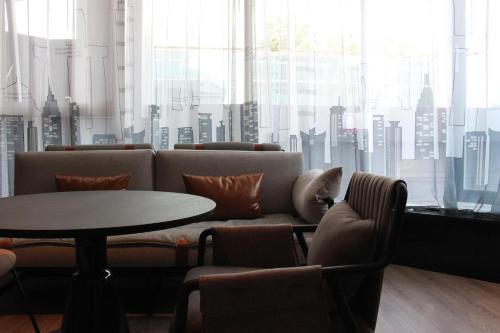 Imagen de la habitación del Hotel Moxy Chongqing. Foto 20