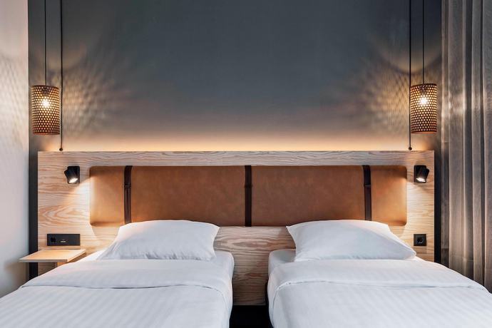 Imagen de la habitación del Hotel Moxy Darmstadt. Foto 4