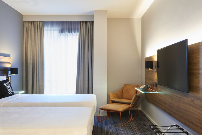 Imagen de la habitación del Hotel Moxy Dublin City. Foto 12