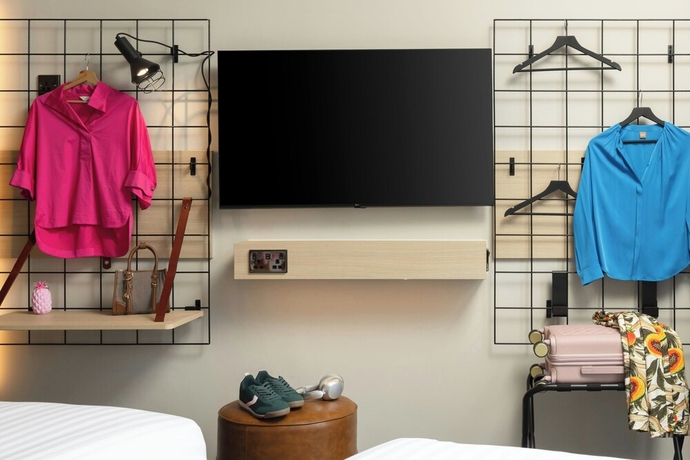 Imagen de la habitación del Hotel Moxy Dublin Docklands. Foto 14