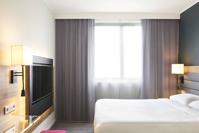 Imagen de la habitación del Hotel Moxy Frankfurt Eschborn. Foto 4