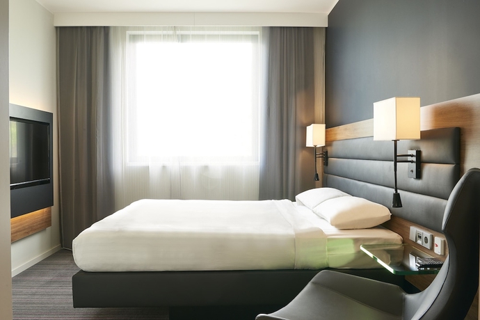 Imagen de la habitación del Hotel Moxy Frankfurt Eschborn. Foto 8