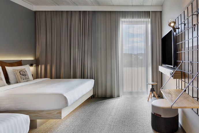 Imagen de la habitación del Hotel Moxy Kaunas Center. Foto 8