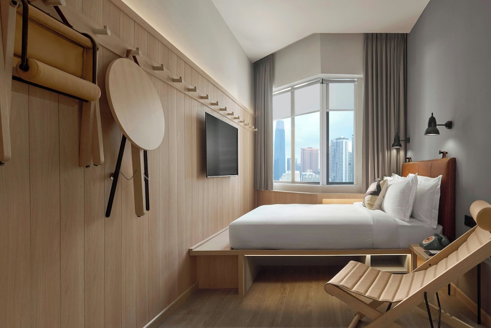 Imagen de la habitación del Hotel Moxy Kuala Lumpur Chinatown. Foto 9