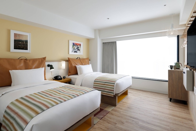 Imagen de la habitación del Hotel Moxy Kyoto. Foto 11