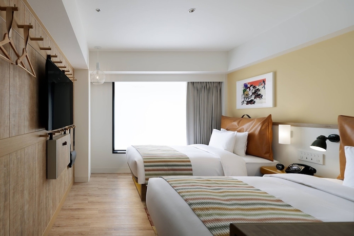 Imagen de la habitación del Hotel Moxy Kyoto. Foto 13