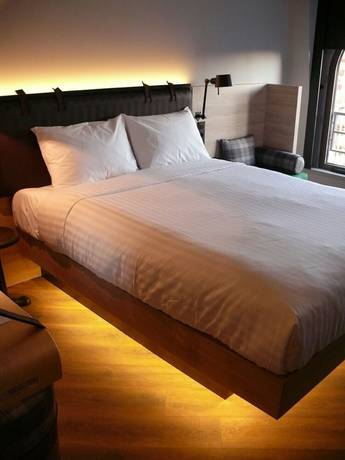 Imagen de la habitación del Hotel Moxy Lille City. Foto 7