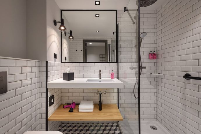 Imagen de la habitación del Hotel Moxy Lisbon City. Foto 8