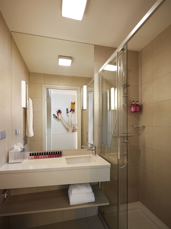 Imagen de la habitación del Hotel Moxy London Stratford. Foto 16