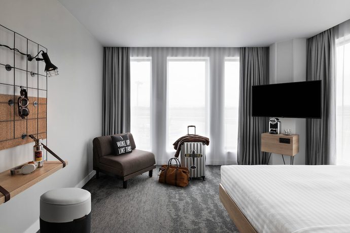 Imagen de la habitación del Hotel Moxy Lyon Airport. Foto 18