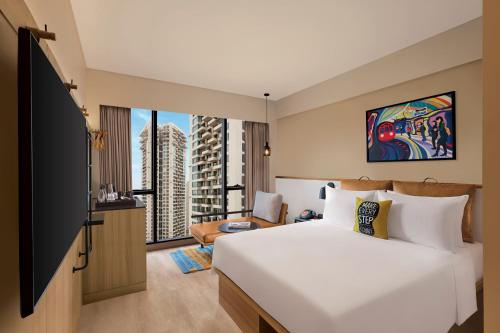 Imagen de la habitación del Hotel Moxy Mumbai Andheri West. Foto 5