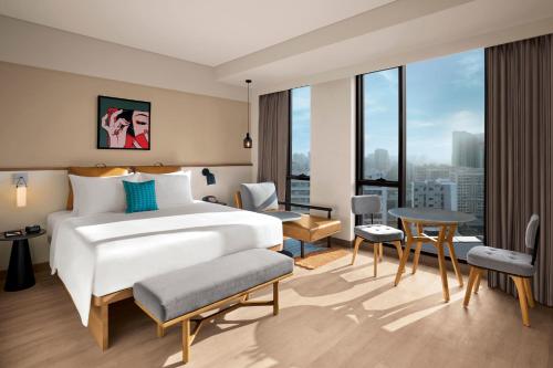 Imagen de la habitación del Hotel Moxy Mumbai Andheri West. Foto 7