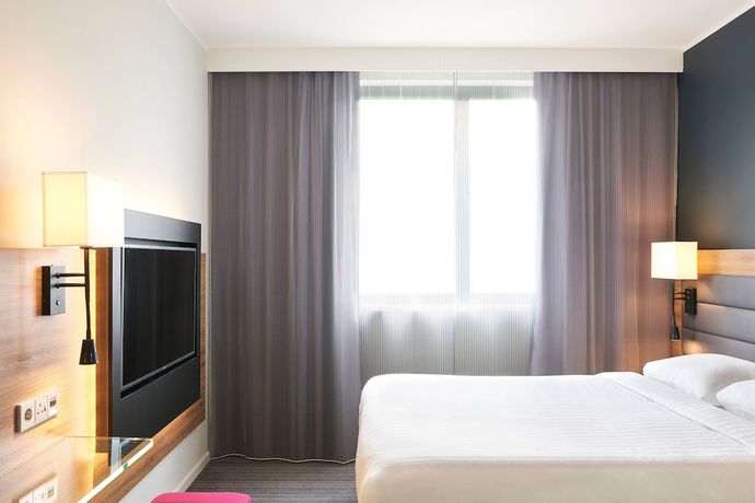Imagen de la habitación del Hotel Moxy Munich Messe. Foto 14
