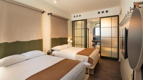 Imagen de la habitación del Hotel Moxy NYC Chelsea. Foto 6