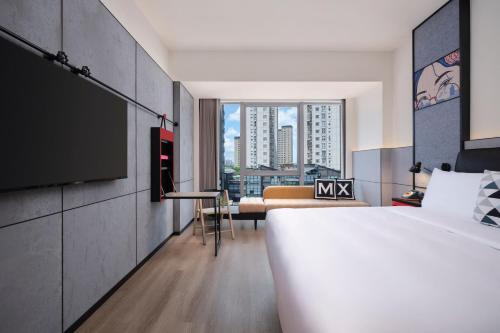 Imagen general del Hotel Moxy Ningbo Old Bund. Foto 15