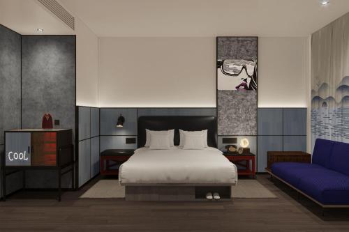 Imagen de la habitación del Hotel Moxy Qiandao Lake. Foto 11