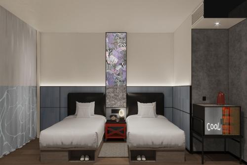 Imagen de la habitación del Hotel Moxy Qiandao Lake. Foto 12