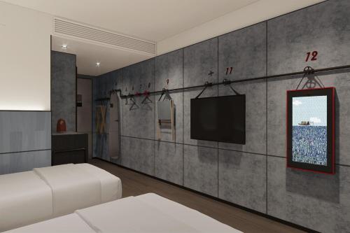 Imagen de la habitación del Hotel Moxy Qiandao Lake. Foto 13