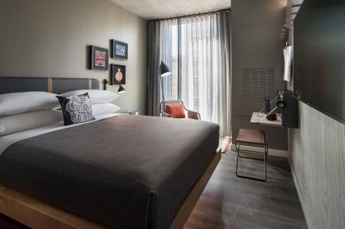 Imagen de la habitación del Hotel Moxy San Diego Downtown/Gaslamp Quarter. Foto 4