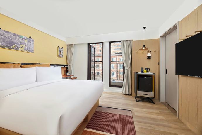 Imagen de la habitación del Hotel Moxy Shanghai Putuo. Foto 4