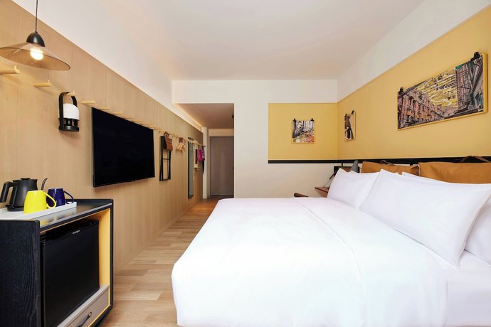 Imagen de la habitación del Hotel Moxy Shanghai Putuo. Foto 5