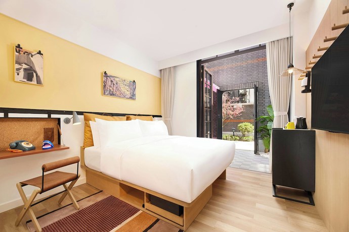 Imagen de la habitación del Hotel Moxy Shanghai Putuo. Foto 6