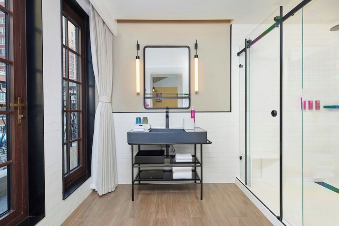 Imagen de la habitación del Hotel Moxy Shanghai Putuo. Foto 8