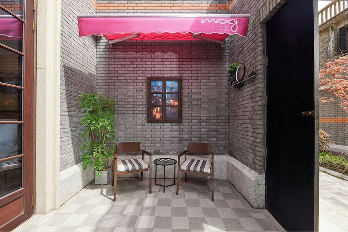 Imagen de la habitación del Hotel Moxy Shanghai Putuo. Foto 9