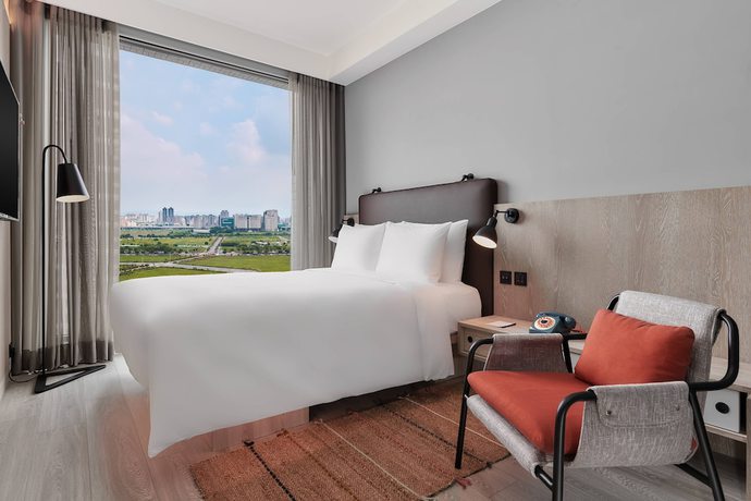 Imagen de la habitación del Hotel Moxy Taichung. Foto 7