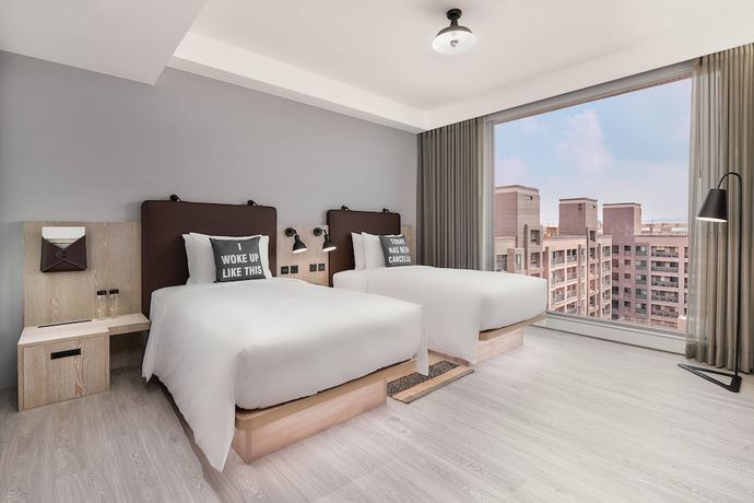 Imagen de la habitación del Hotel Moxy Taichung. Foto 8