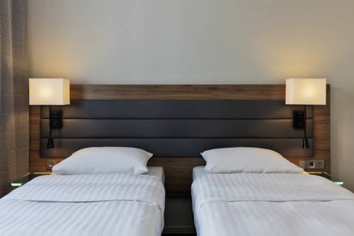 Imagen de la habitación del Hotel Moxy Vienna Airport. Foto 4