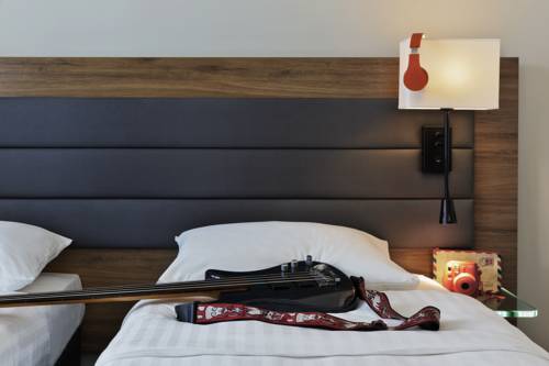 Imagen de la habitación del Hotel Moxy Vienna Airport. Foto 5