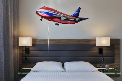 Imagen de la habitación del Hotel Moxy Vienna Airport. Foto 9