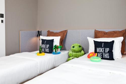 Imagen de la habitación del Hotel Moxy Vienna City East. Foto 16